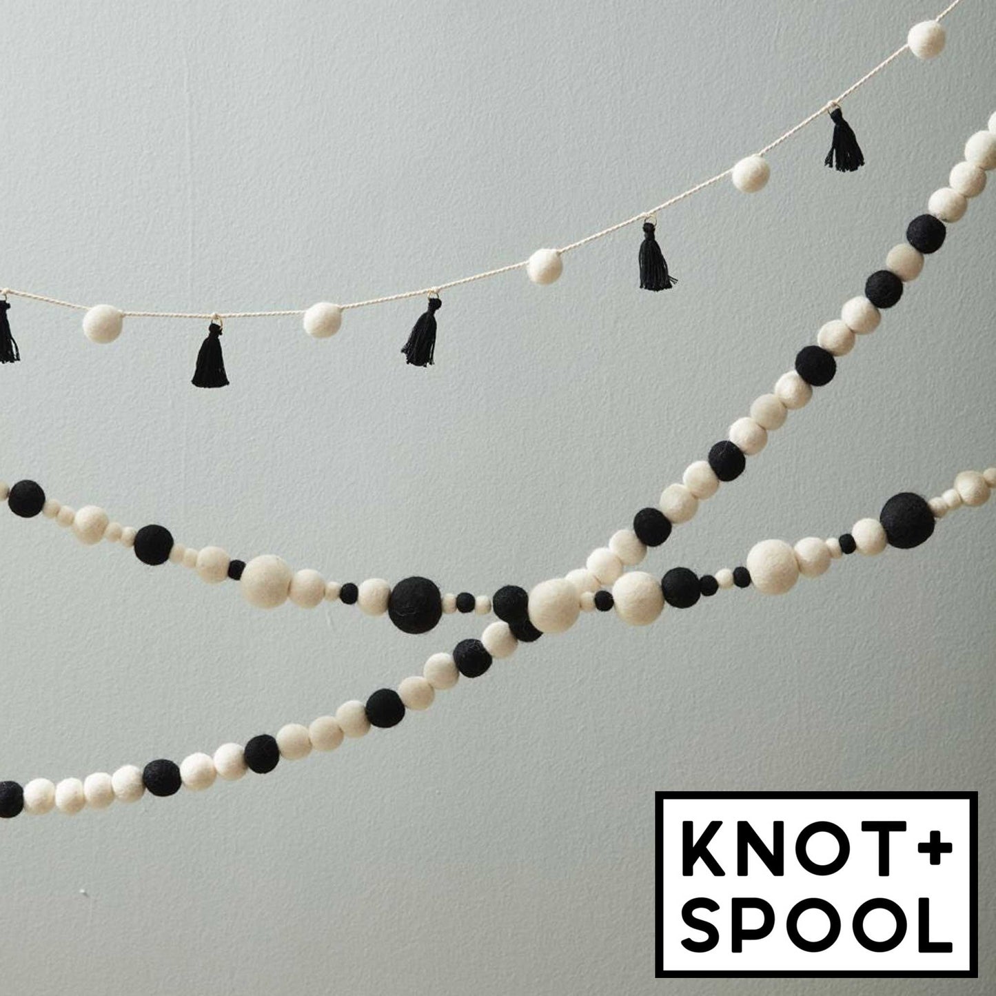 Candy Garland - White Poms & Black Tassels - 72 Inches