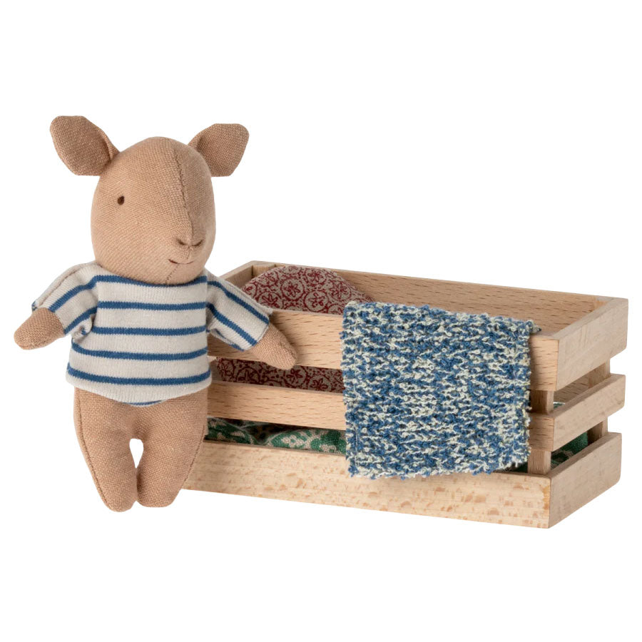 Maileg Baby Boy Pig standing proudly beside its decorative box