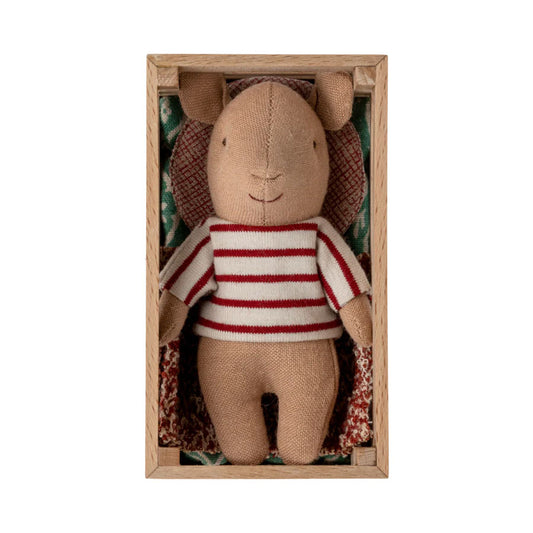 Maileg Baby Girl Pig plush toy nestled in a wooden crate