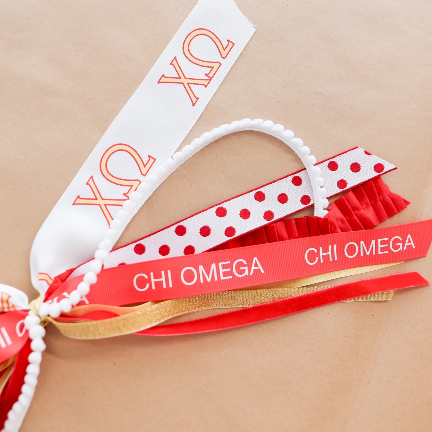 Chi Omega Ribbon Tassel - Knot and Spool