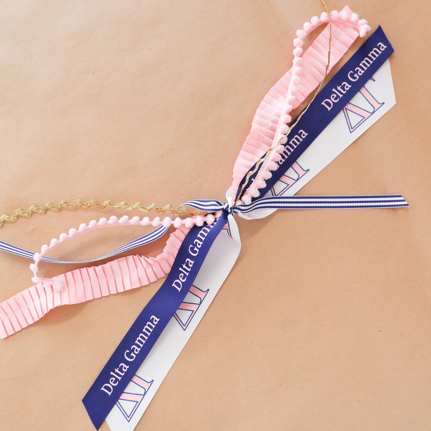 Delta Gamma Ribbon Tassel - Knot and Spool
